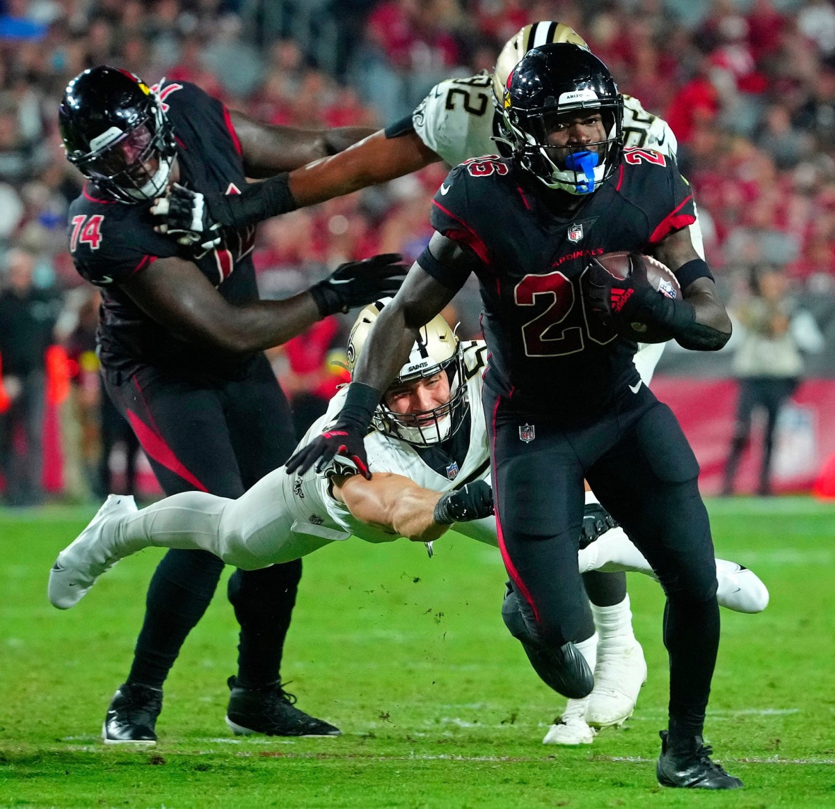 Cardinals Eno Benjamin (26) breaks down field against the Saints. © Patrick Breen/The Republic / USA TODAY NETWORK